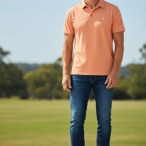 Travis Mathew Coral Polo Shirt